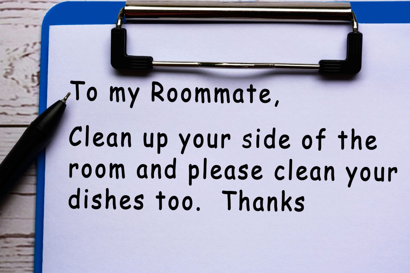 Notepad reminding your difficult roommate to clean up their side of the room