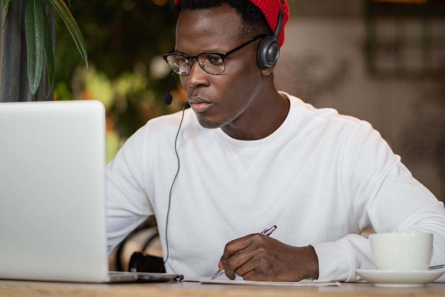 Student with his headphones on a college campus