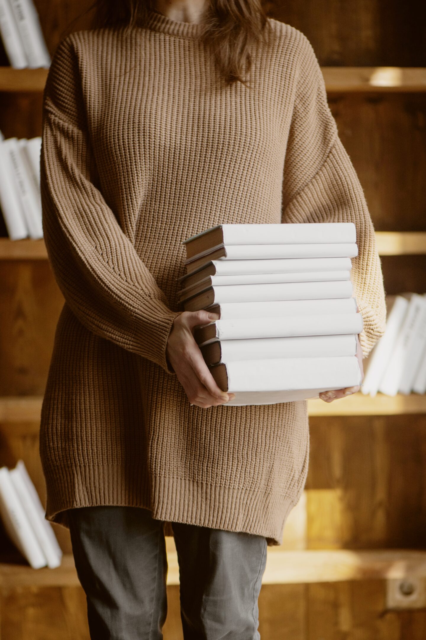 College student with her textbooks to study and not fail a class three times